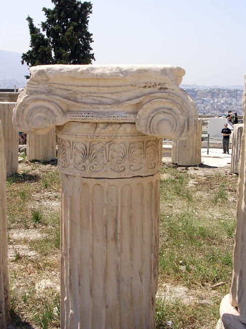 A column from the Parthenon sitting on the ground.